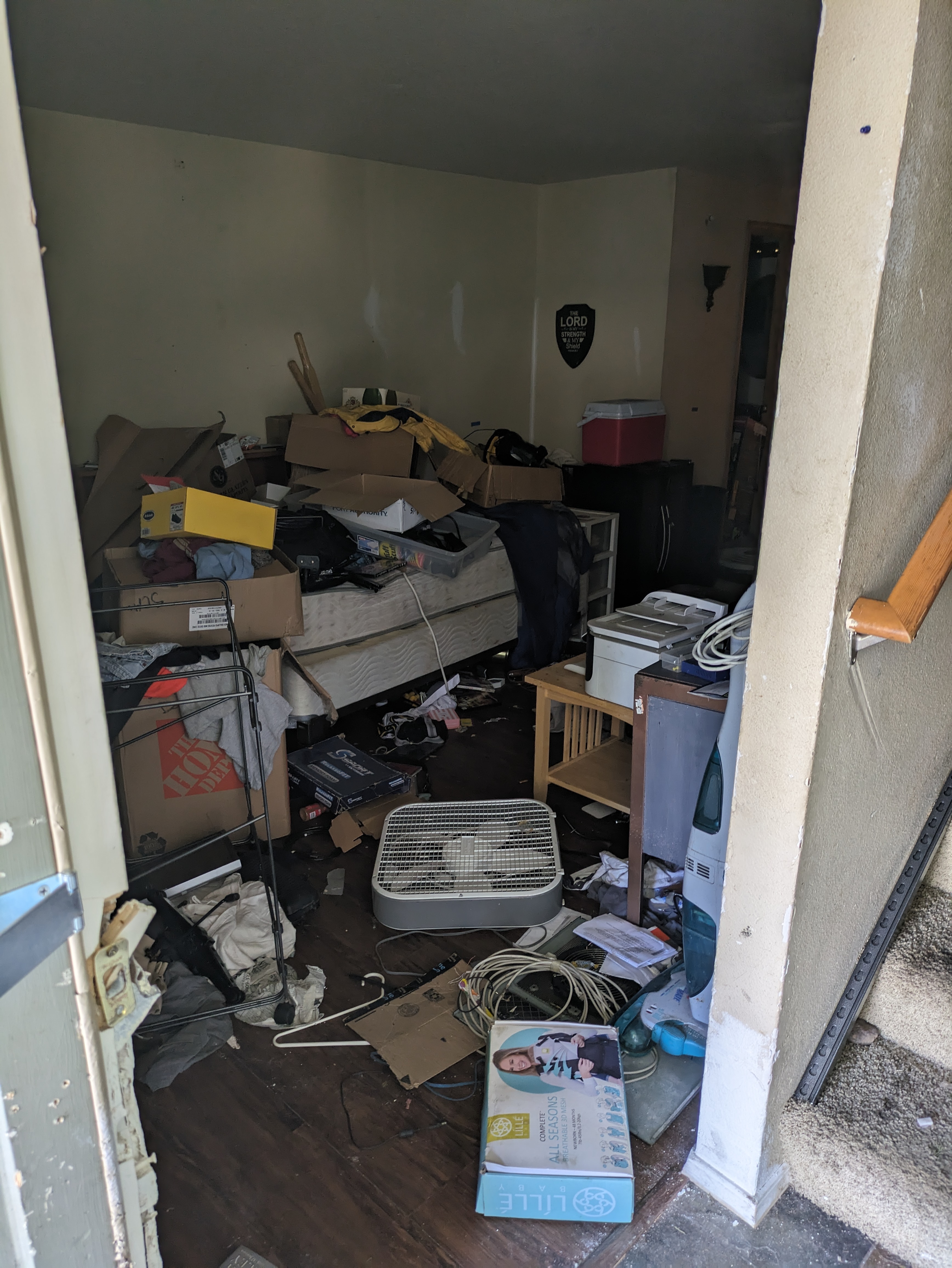 Condo hoarder cleanout before