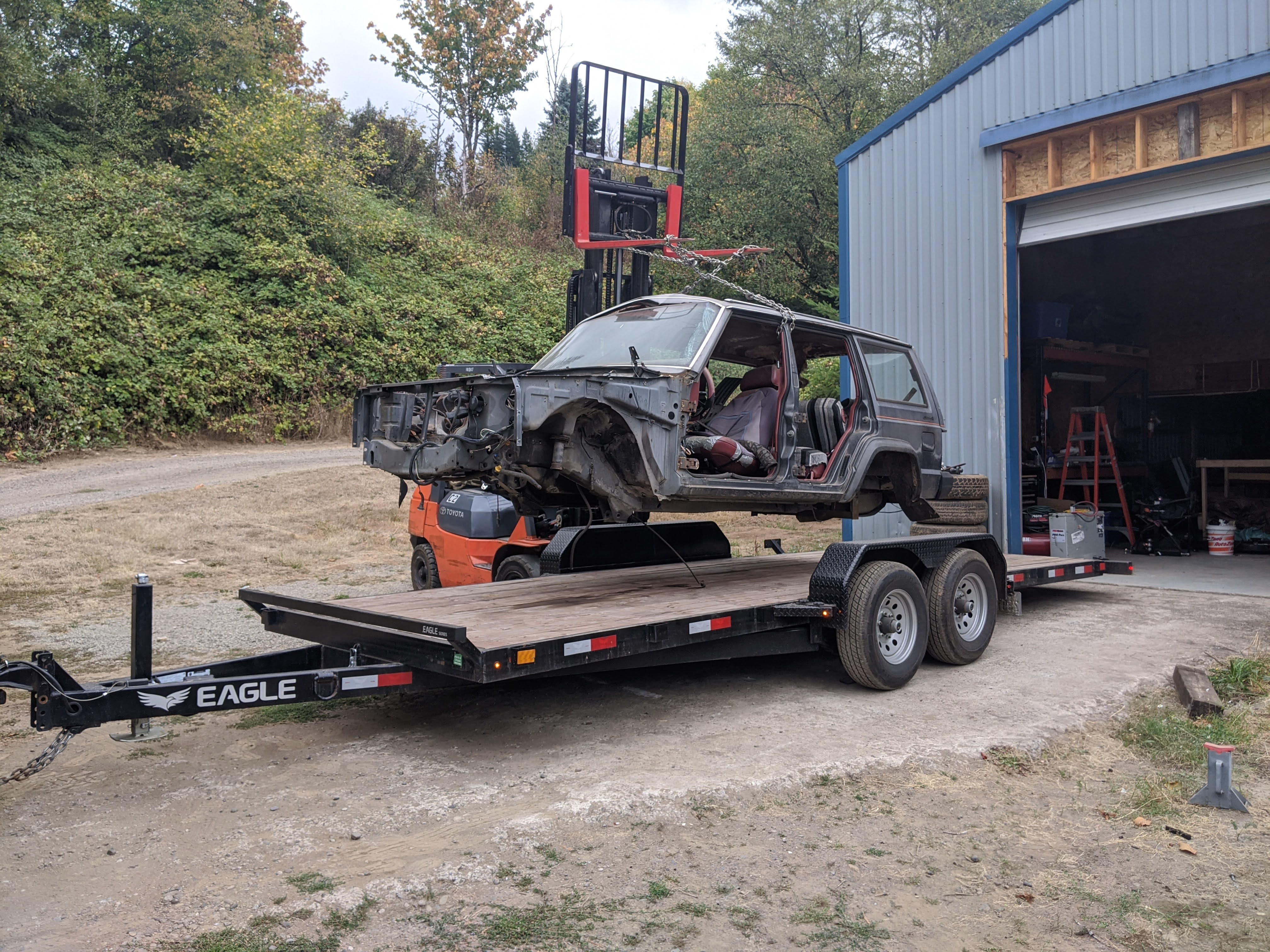 Scrap Jeep Loaded for Removal